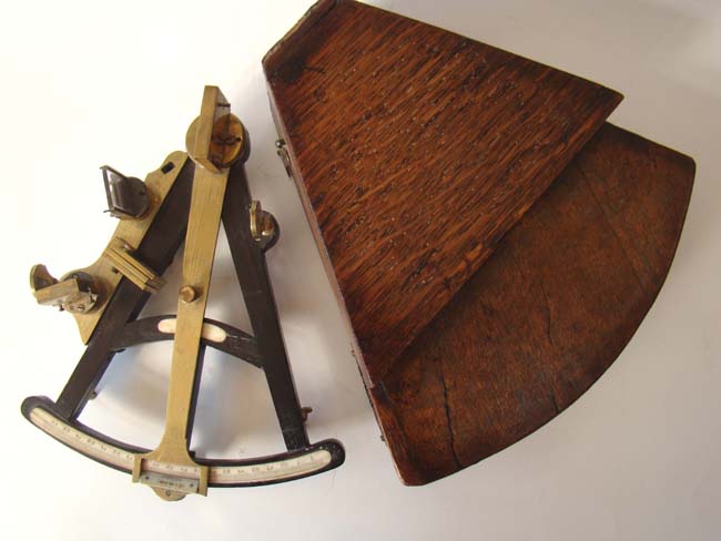 A diminutive ebony framed mariner's octant circa 1815-1835 possibly used aboard the Trident, a whaling ship from New Bedford.